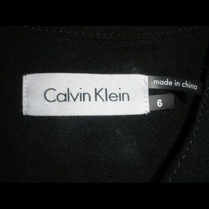 Calvin Klein
Black Gold Buttons and Sleeveless